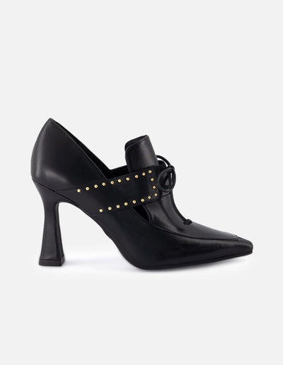 Zapatilla tipo mercedes de piel para mujer color negro con detalle de cordones
