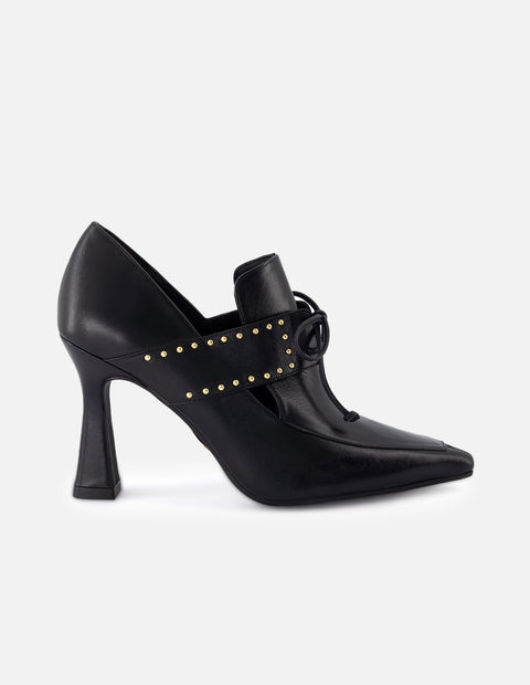 Zapatilla tipo mercedes de piel para mujer color negro con detalle de cordones