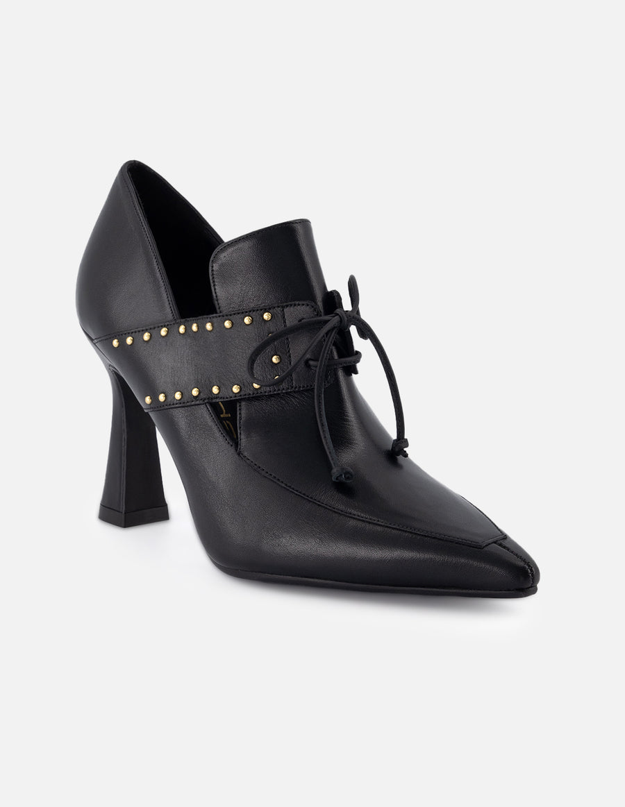Zapatilla tipo mercedes de piel para mujer color negro con detalle de cordones