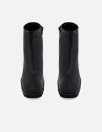 Botines color negro charol para mujer con suela dentada