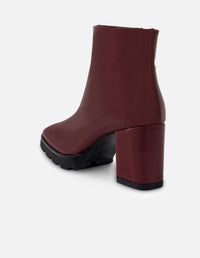 Botines color vino de charol para mujer con suela dentada