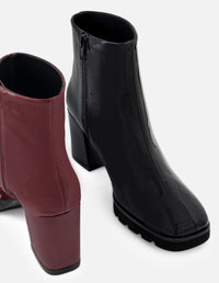 Botines color vino de charol para mujer con suela dentada