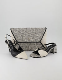 Zapatilla bicolor en piel para mujer con estampado laberinto