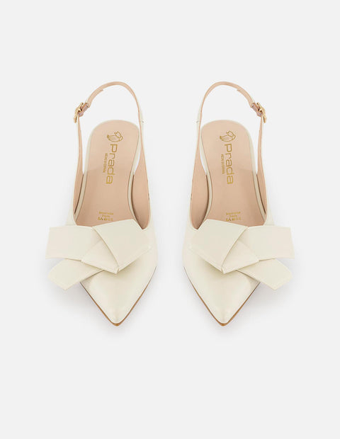 Zapatilla blanca en piel para mujer con moño y tacón tipo madera