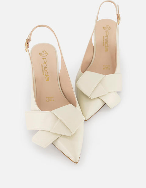 Zapatilla blanca en piel para mujer con moño y tacón tipo madera