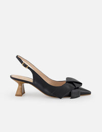 Zapatilla negra en piel para mujer con moño y hebilla dorada