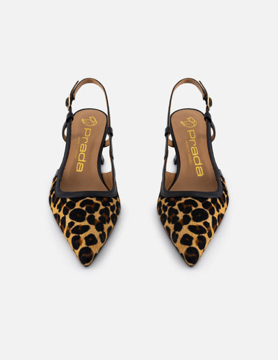 Zapatilla para mujer de pelo animal print color negro y decorado de tiras