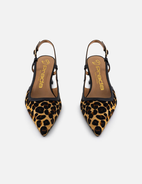 Zapatilla para mujer de pelo animal print color negro y decorado de tiras