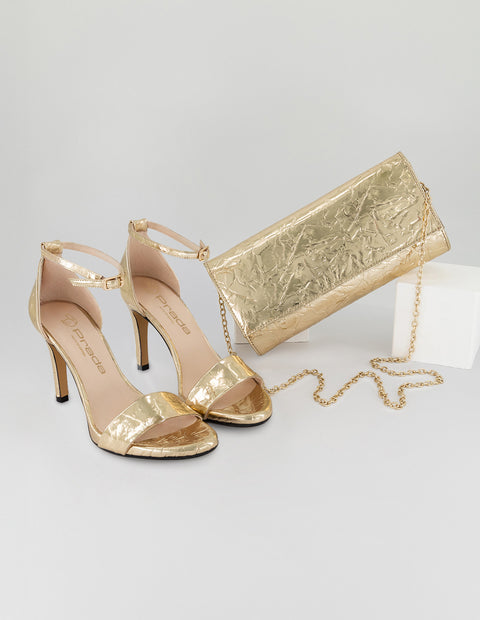 Sandalias color dorado piel metalizada para mujer con tacón alto