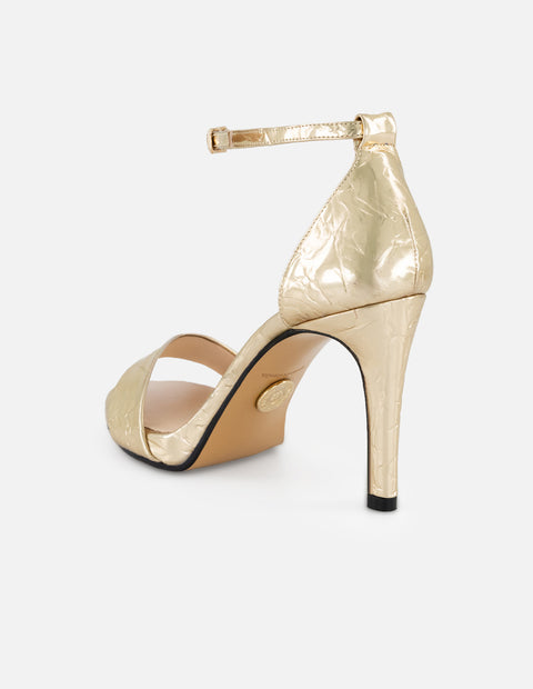 Sandalias color dorado piel metalizada para mujer con tacón alto