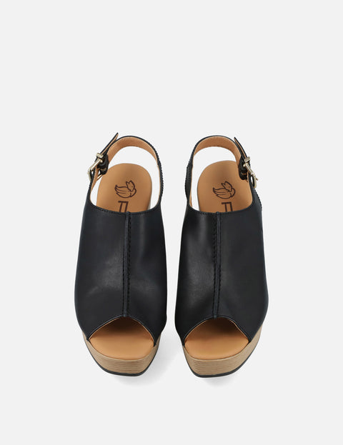 Zueco de piel para mujer color negro con plataforma tipo madera