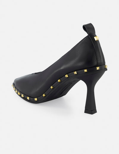 Zapatillas formales para mujer de piel color negro con detalles en color dorado