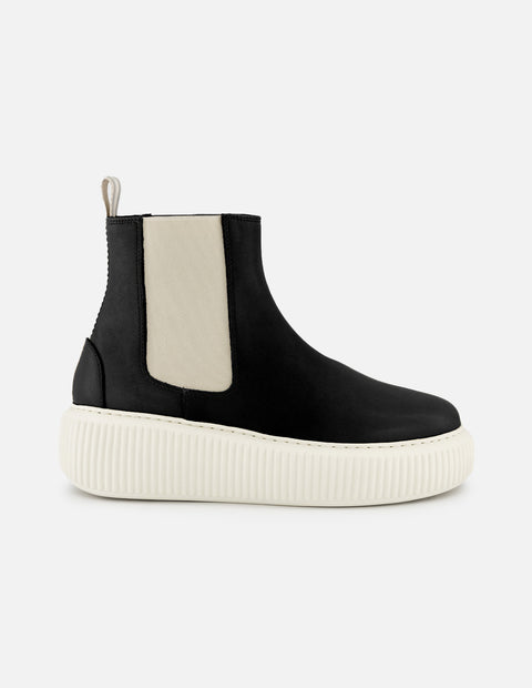 Botín chelsea de piel color negro para mujer con detalles en blanco
