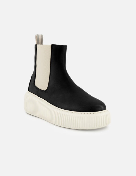 Botín chelsea de piel color negro para mujer con detalles en blanco