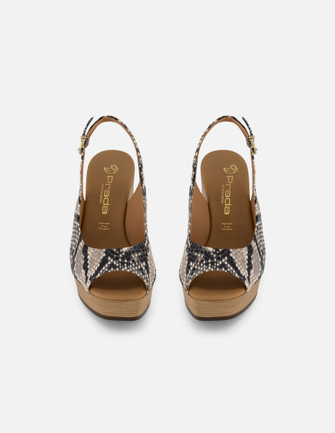 Sandalias blancas tipo serpiente para mujer con tacón madera