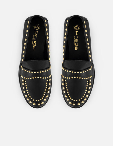 Mocasines negros piel de mujer adornos color dorado tira frontal