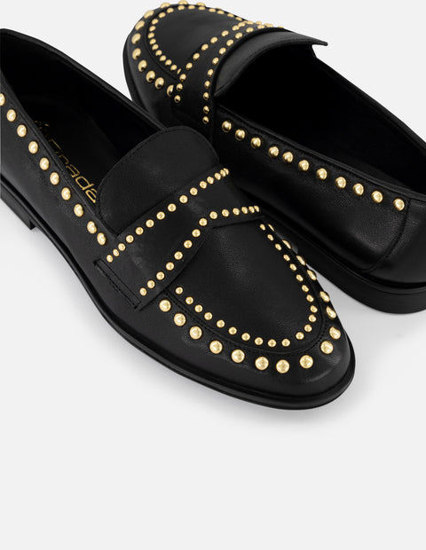 Mocasines negros piel de mujer adornos color dorado tira frontal