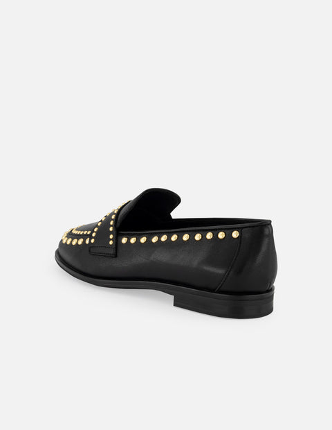 Mocasines negros piel de mujer adornos color dorado tira frontal
