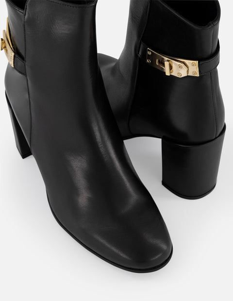 Botines negros piel de mujer adorno lateral color dorado Pd