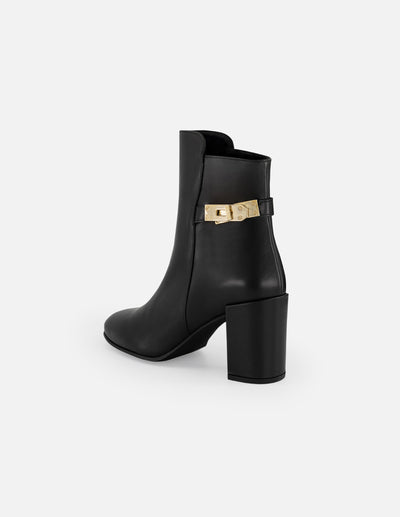 Botines negros piel de mujer adorno lateral color dorado Pd