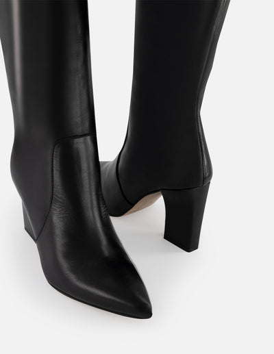 Botas negras piel de mujer con elástico logo Pd color dorado