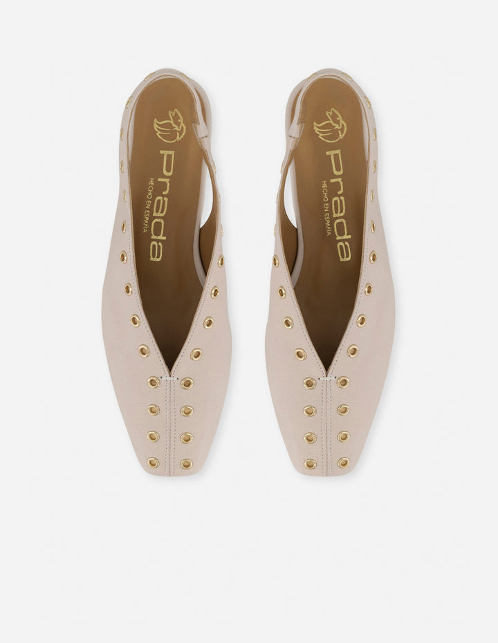 Flats nude en piel metalizada para mujer con ojillos metálicos