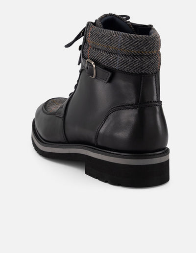 Botines negros piel y textil para hombre con hebilla lateral