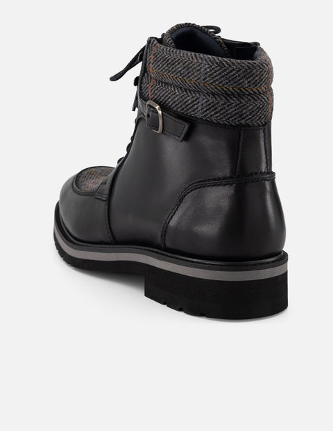 Botines negros piel y textil para hombre con hebilla lateral
