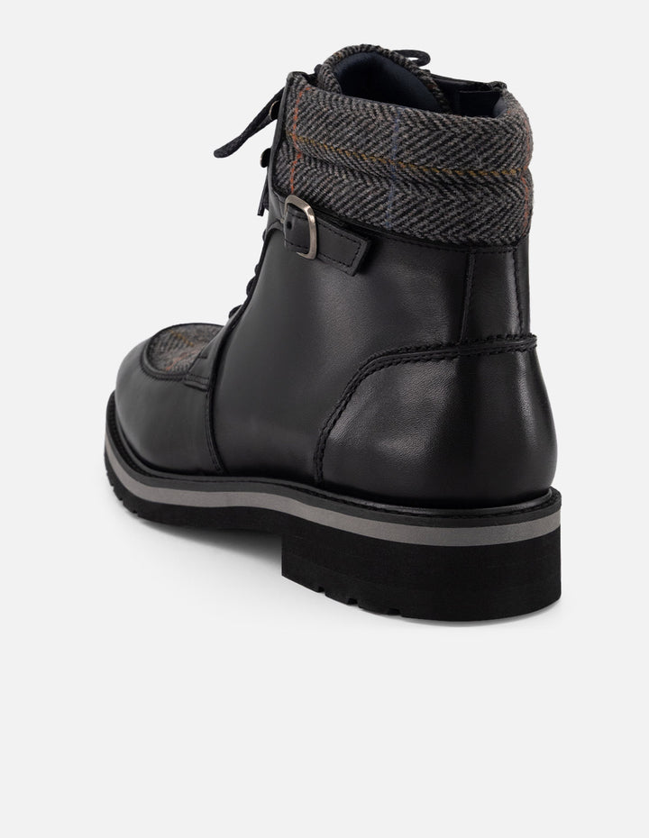 Botines negros piel y textil para hombre con hebilla lateral