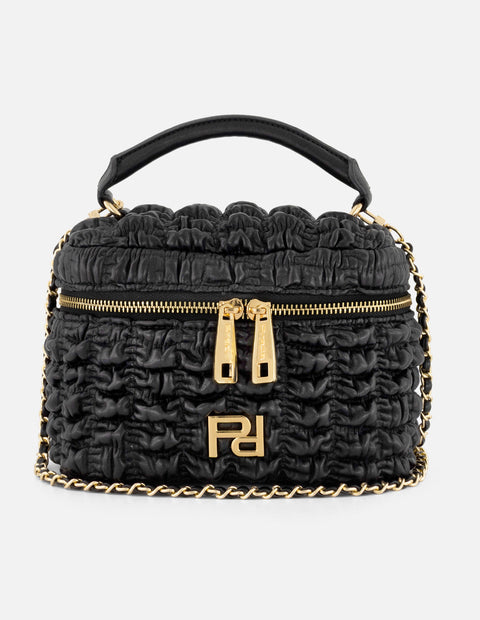 Minibolso negro vegano para mujer con diseño capitonado