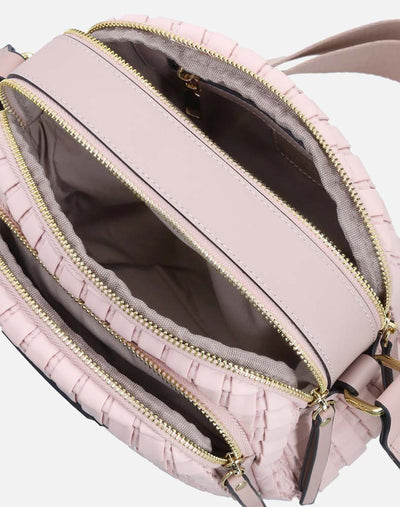 Bolso bandolera en piel vegana color nude y  tres compartimientos con cierres para mujer