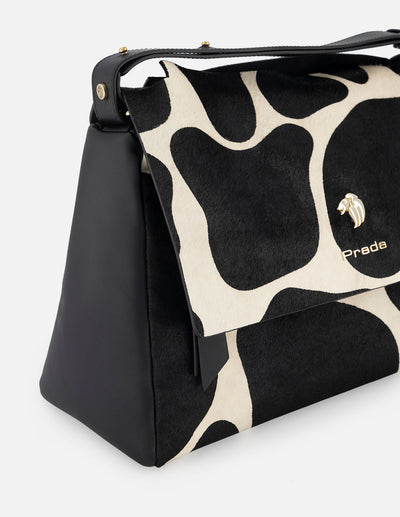 Bolso bowling de pelo color negro para mujer con detalles de apariencia jirafa