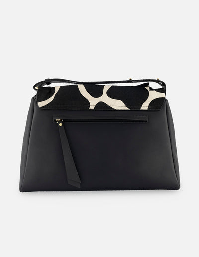 Bolso bowling de pelo color negro para mujer con detalles de apariencia jirafa