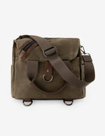 Mochila verde textil para hombre con detalles en piel marrón