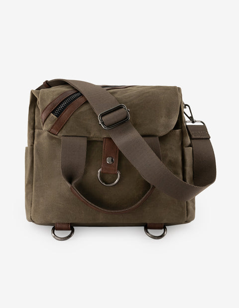 Mochila verde textil para hombre con detalles en piel marrón