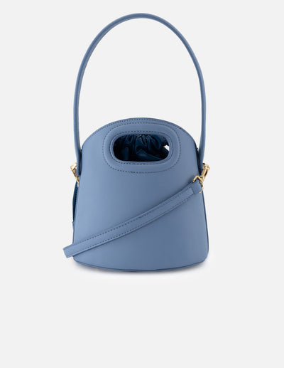 Bolso bucket de piel vegana para mujer color azul y detalles en piel