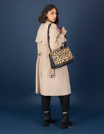 Satchel animal print de pelo para mujer con solapa