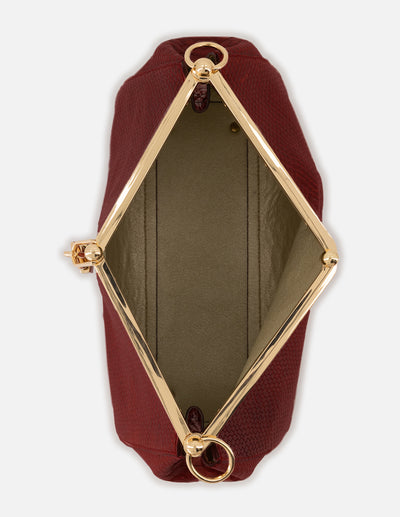 Bolso de hombro color vino de piel para mujer con grabado tipo serpiente