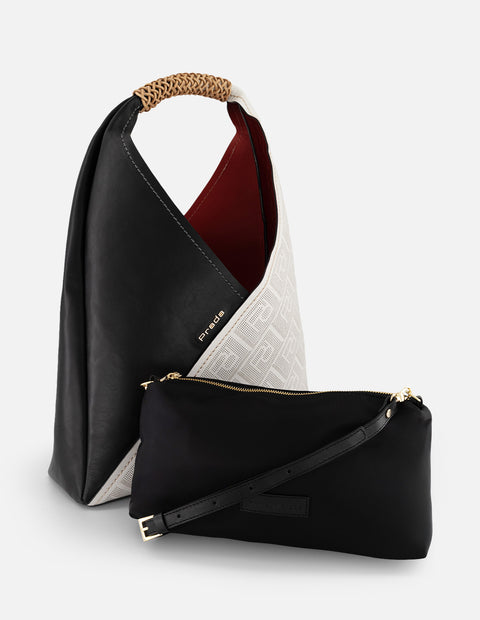 Bolsa hobo negro piel picada para mujer con contraste frontal