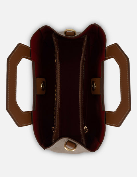 Bolso de mano color dorado piel para mujer con diseño geométrico