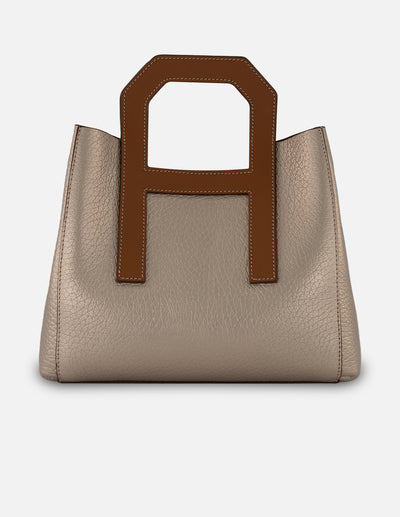 Bolso de mano color dorado piel para mujer con diseño geométrico