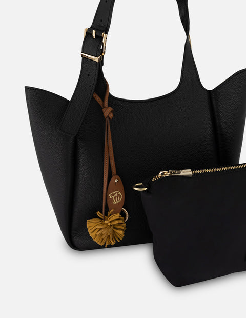 Bolso de hombro negro piel para mujer con pompones decorativos