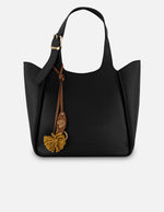 Bolso de hombro negro piel para mujer con pompones decorativos