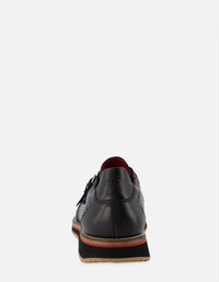 Monk de piel napa color negro con picado para hombre