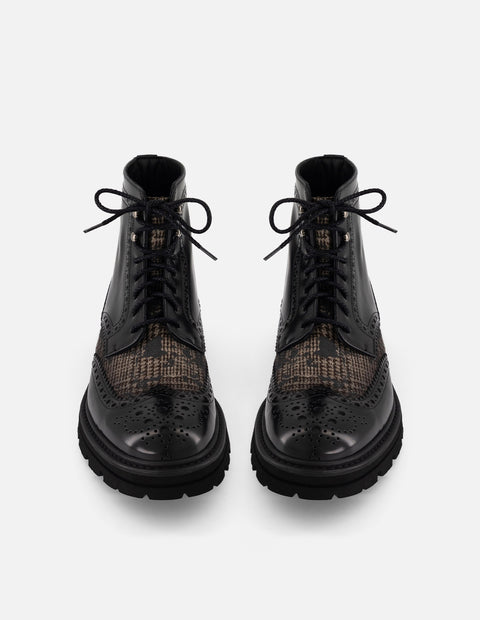 Bota negra piel y textil para hombre con combinación de materiales