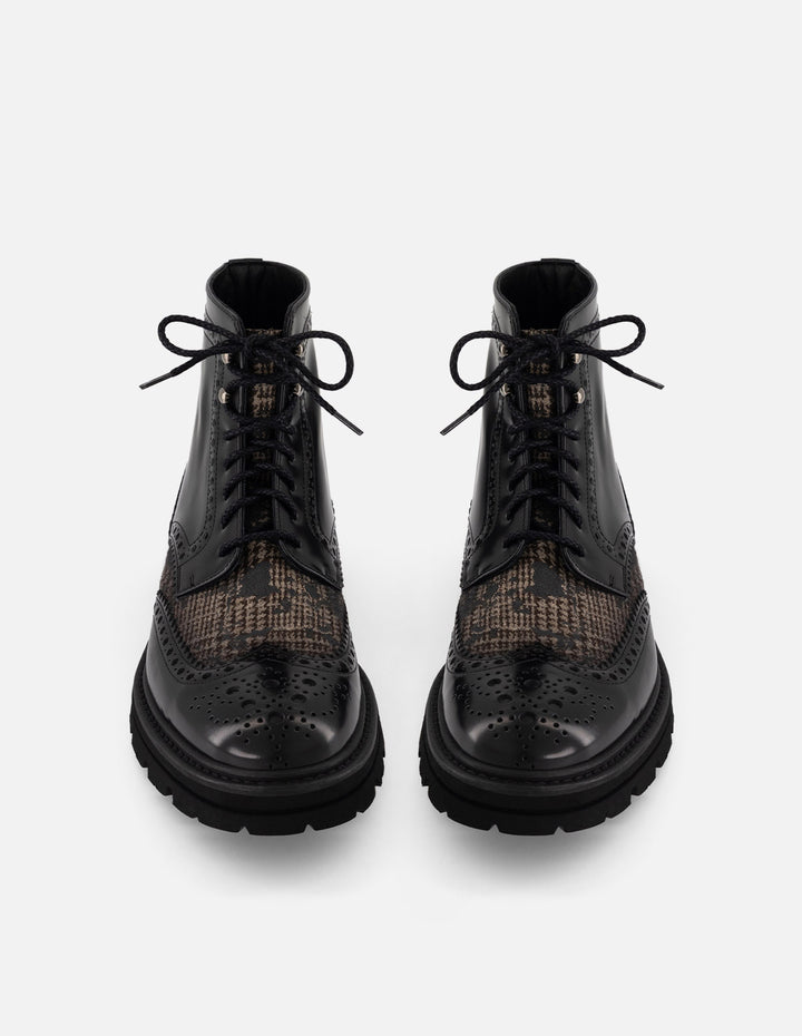 Bota negra piel y textil para hombre con combinación de materiales