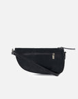 Bolso bandolera asimétrico de charol en color negro para mujer