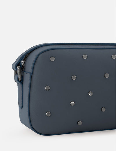 Bandolera de piel color azul para mujer con detalles en color níquel