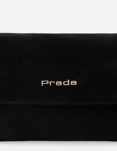 Clutch de ante para mujer color negro con muñequera desmontable
