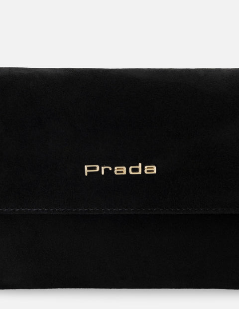 Clutch de ante para mujer color negro con muñequera desmontable
